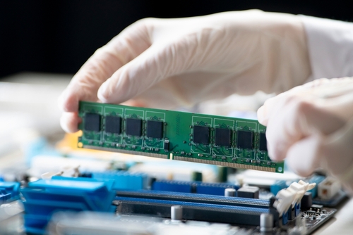 Server memory modules being installed in a rack